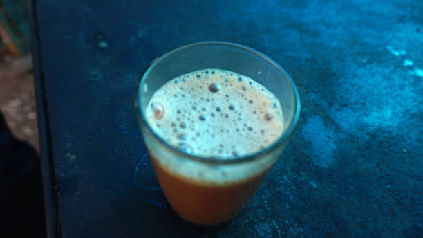 istock Glass filled with Tea made in a roadside stall in Kerala 1207061472