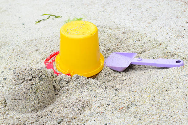Bucket and shovel. Concept: vacation by the sea with children. Nikon D5300