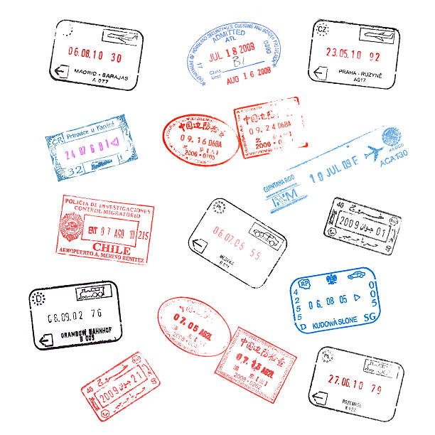 Close-up on a bunch of passport stamps from around the world.