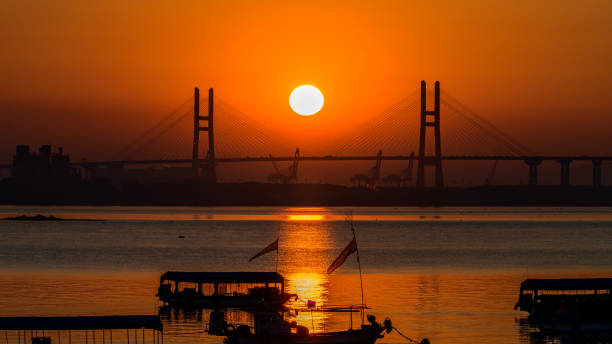 istock The sun rises on the bridge today. 1207064366