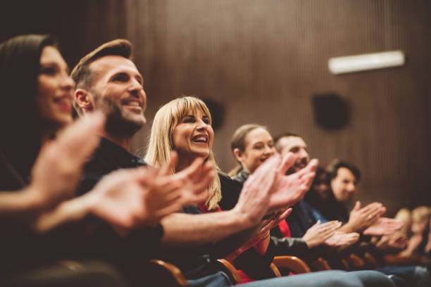 istock Happy audience applauding in the theater 1207066033