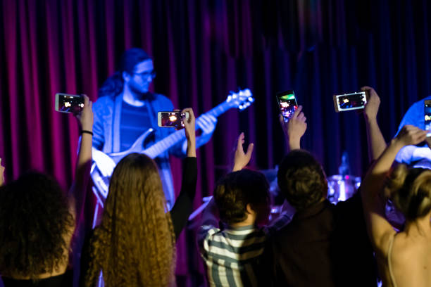 istock Taking picture in at a concerts 1207066166
