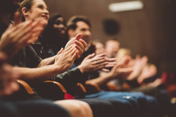 istock Happy audience applauding in the theater 1207066224
