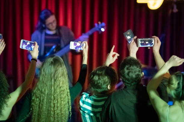 istock Taking picture in at a concerts 1207066348