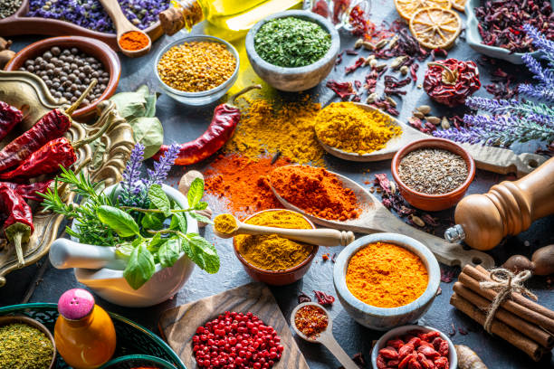istock Spices herbs condiments seasoning on grunge gray background 1207067093