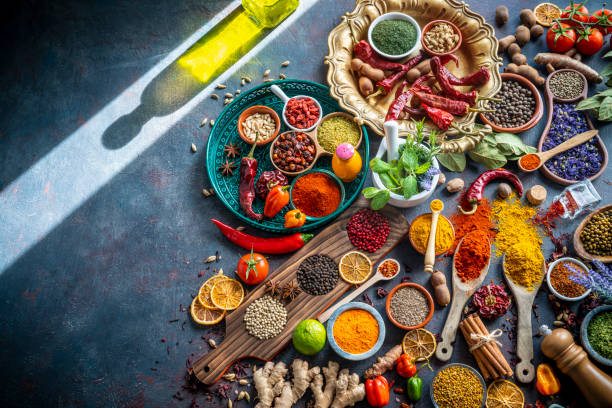 istock Spices herbs condiments seasoning on grunge gray background 1207067159