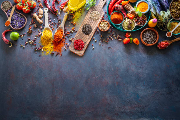 istock Spices herbs condiments seasoning on grunge gray background 1207067217