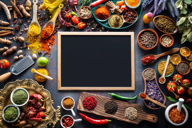 istock Spices herbs condiments seasoning on grunge gray background 1207067245