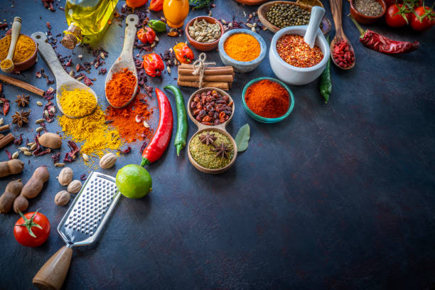 istock Spices herbs condiments seasoning on grunge gray background 1207067341