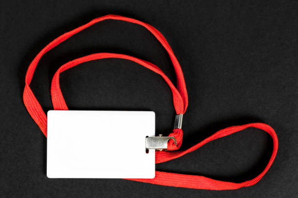 istock Empty card ID / icon with an orange belt on a black background. Space for text 1207067511