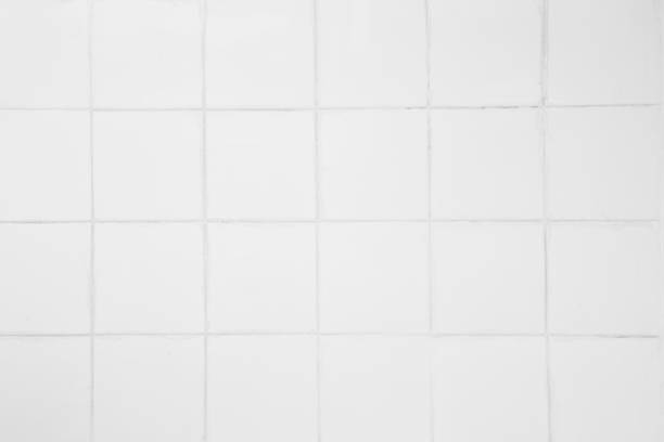 istock white tiles wall streak texture background vintage using classical background or use it in design and decorative. 1207067727