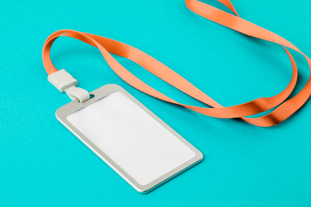 istock Empty ID card / icon with an orange belt, on a blue background. Space for text. 1207067887