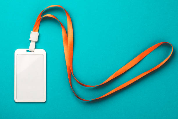 istock Empty ID card / icon with an orange belt, on a blue background. Space for text. 1207067992