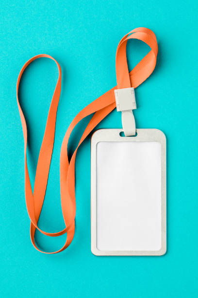 istock Empty ID card / icon with an orange belt, on a blue background. Space for text. 1207069562