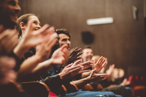 istock Happy audience applauding in the theater 1207069666