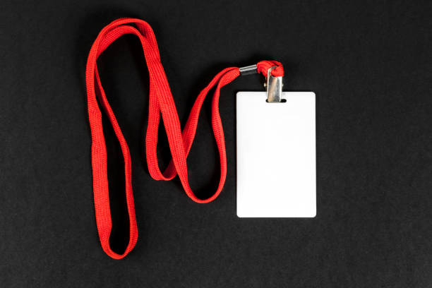 istock Empty card ID / icon with an orange belt on a black background. Space for text 1207069873