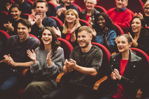 istock Happy audience applauding in the theater 1207069904