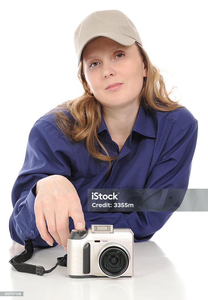 Женщина с помощью камеры - Стоковые фото Бейсболка роялти-фри