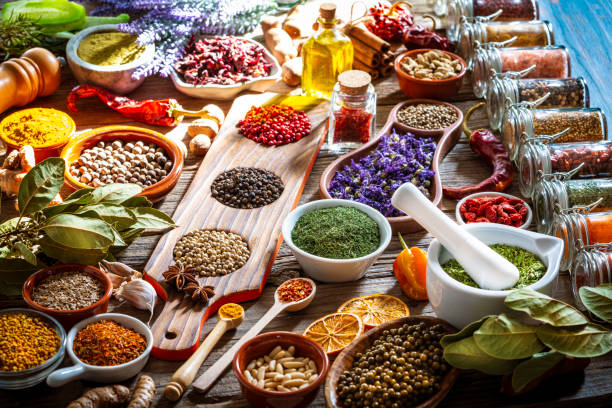 istock Spices herbs condiments seasoning on rustic wooden table 1207073667