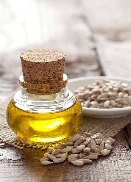 istock Sunflower seed oil in clear jar with cork top  120707374