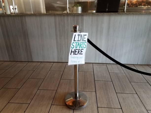 istock line starts here ordering and pickup sign in restaurant 1207073989