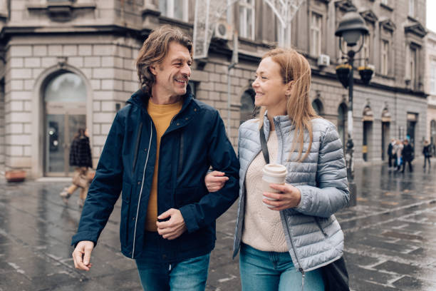 istock Couple walking through the city and enjoying 1207074331