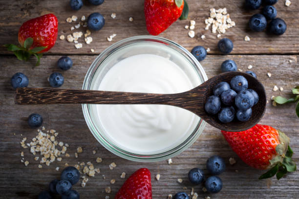 istock Strawberries, blueberries, oat flakes and yoghurt 1207076113