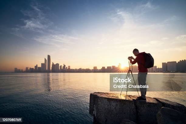 Photographer At Sunrise Stock Photo - Download Image Now - Photographer, Tripod, City