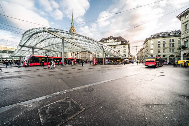 Bern station square with canopy and Church of the Holy Spirit, Switzerland stock photo