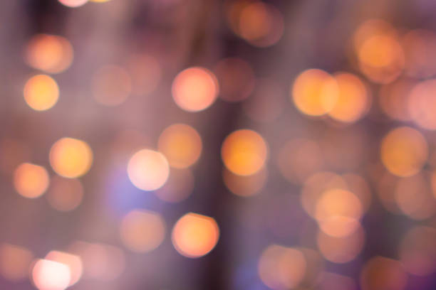 istock Colorful bokeh defocused blurred lights. Abstract background 1207087544