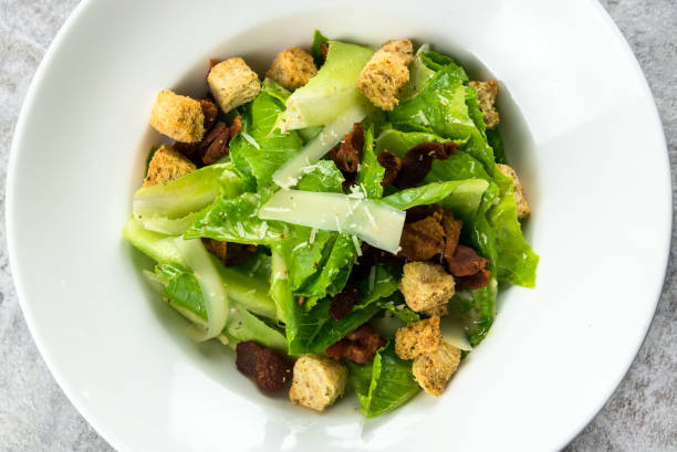istock Salad with Grilled bacon, cesar salad served with Green Cos 1207090957