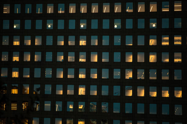 istock Manhattan office building from below and a jet 1207091105