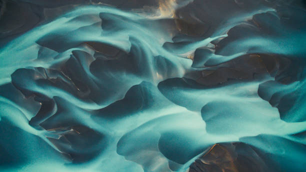 istock Aerial drone view of a huge riverbed and delta, glacial river system transporting deposits from the Vatnajokull glacier,Iceland 1207092845