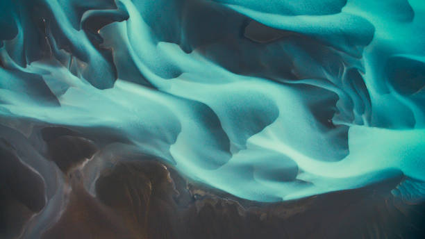 istock Aerial drone view of a huge riverbed and delta, glacial river system transporting deposits from the Solheimajokull glacier,Iceland 1207092878