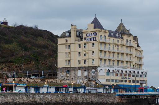 Llandudno, UK: Jan 25, 2020: The Grand Hotel is owned by Britannia Hotels since 2004. Once the largest hotel in wales, it occupies a commanding site at the foot of Great Orme, adjacent to the pier.