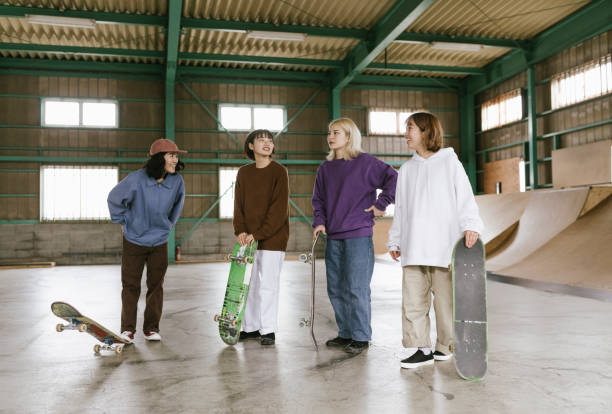 istock Group of skateboarders 1207094620