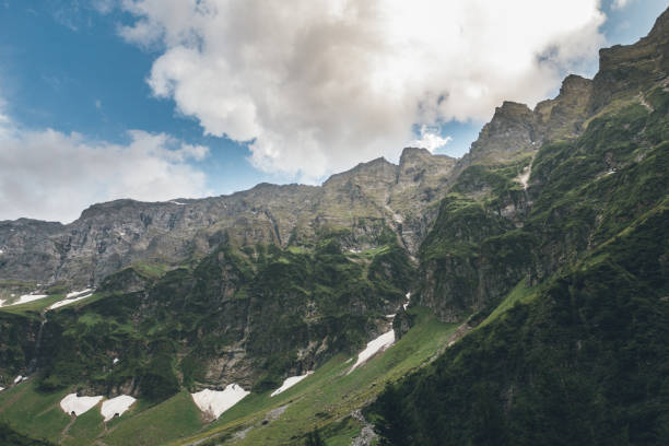 istock Summer landscape in mountains and the dark blue sky with clouds 1207096707