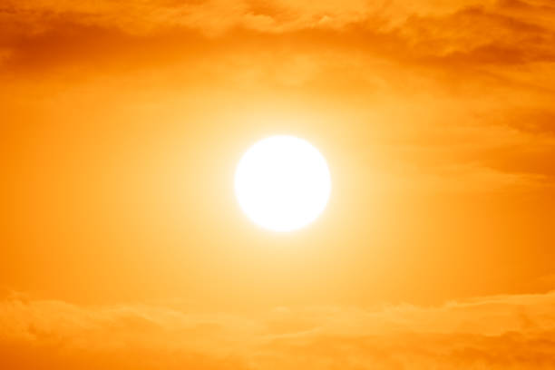 istock Red sunset and cloud on golden sky background 1207096766