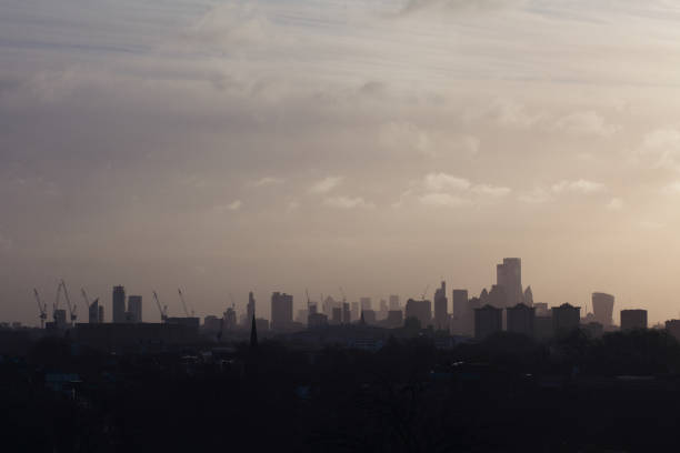 London panorama from Primrose Hill on early misty morning in January, pastel blurred scenics stock photo