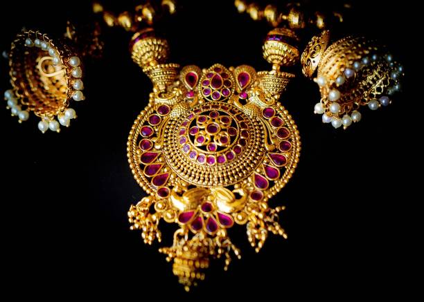 istock Gold on Black Jewelry 1207097670