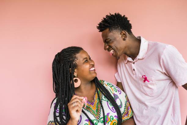 istock Fun couple in pink October campaign 1207100443