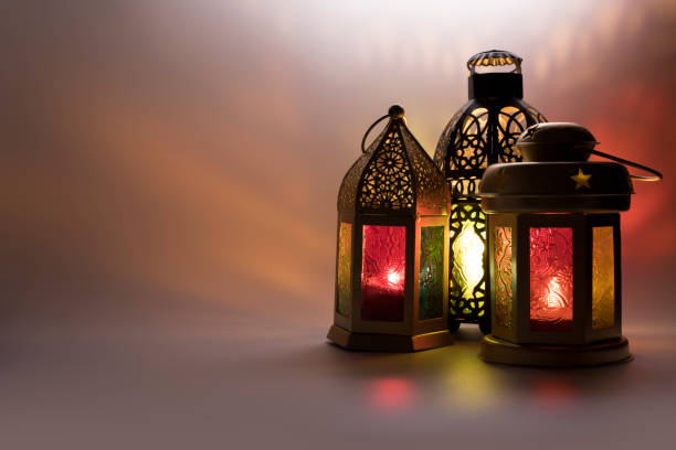 istock Lanterns photo in low light effect for Eid and Ramadan Greeting cards. 1207101499