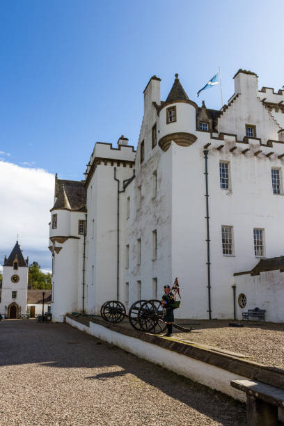 Bagpiper in the Highlands Pitlochry Scotland - September 12 2019: Stuart the piper performing outside of Blair Castle in the Scottish Highlands, Perthshire UK September 12, 2019 tartan army stock pictures, royalty-free photos & images