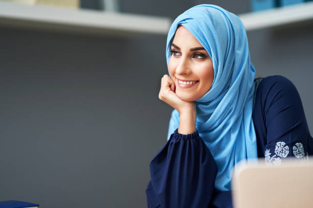 istock Muslim female student learning at home 1207103494