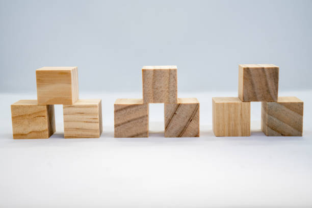 istock wooden cubes isolated on white background 1207105697
