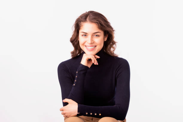 istock Happy young woman studio portrait 1207106223