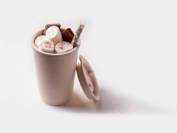 istock Reusable cup with sweet yrshmelo and chocolate on a white background. 1207106563