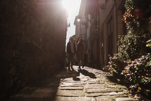Young couple of lovers walking in Porto, Portugal