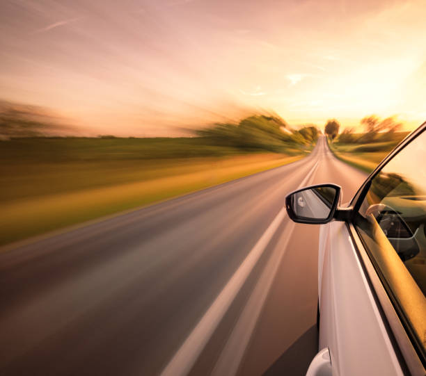 Driving on the road Driving on a beautiful spring day. motor vehicle photos stock pictures, royalty-free photos & images