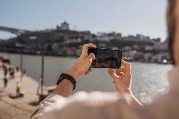 istock Man taking a picture with a smartphone 1207109318